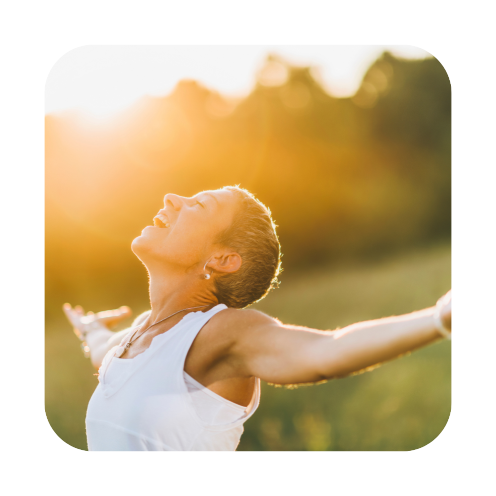 Woman soaking in the sunlight outside