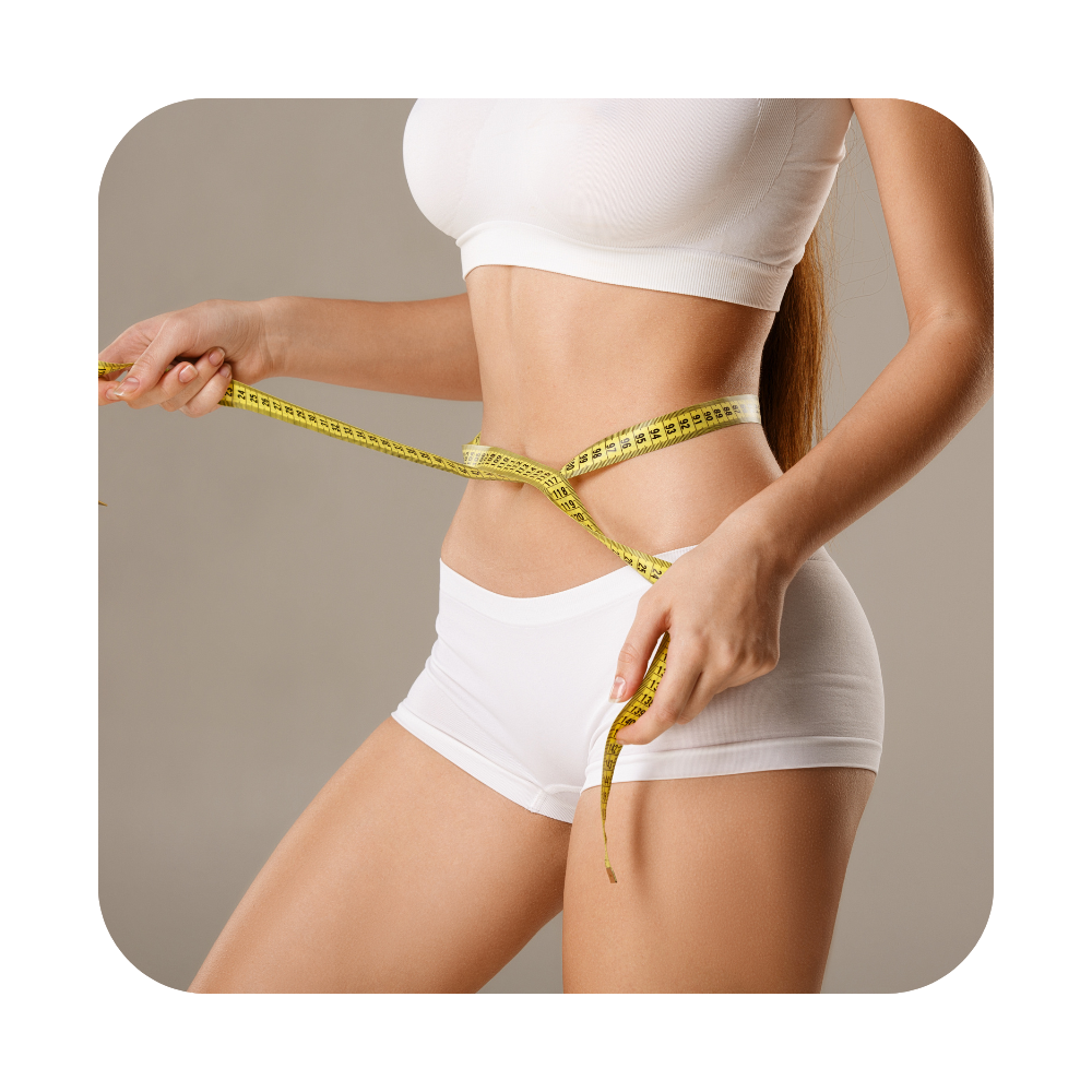 Woman measuring her waist with tape